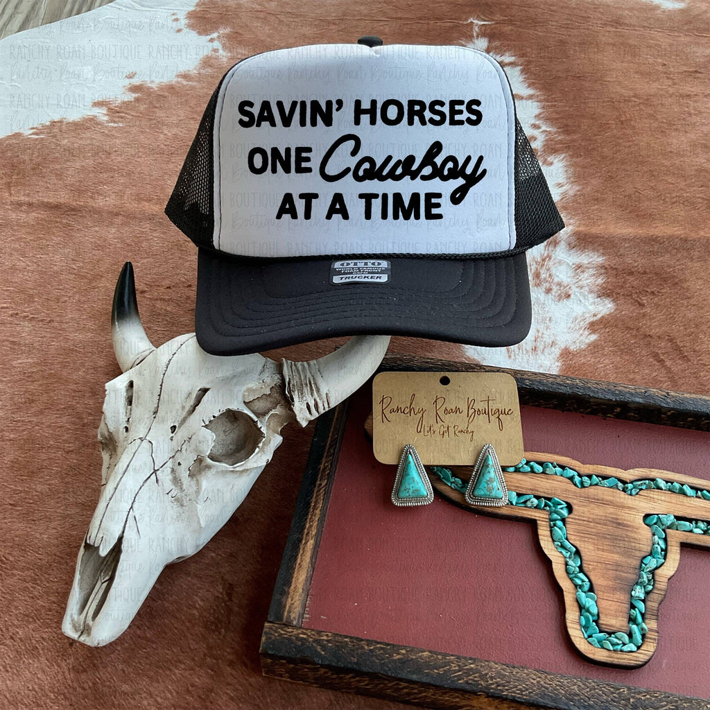 Savin Horses One Cowboy at a Time Trucker Hat